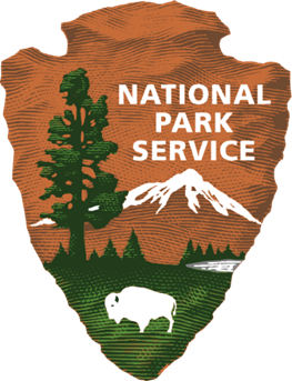 A logo with &quot;National Park Service&quot; and a bison in front of a large tree and mountain